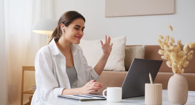 woman-waving-at-screen
